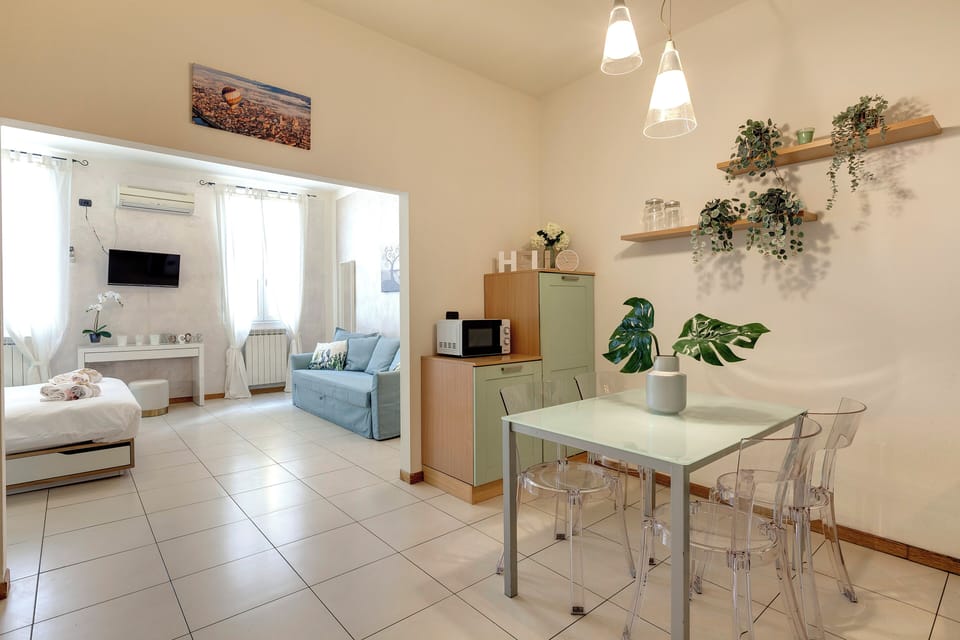 Apartment | Living area | 24-inch flat-screen TV with digital channels