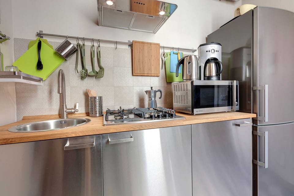 Apartment | Private kitchenette | Full-size fridge, microwave, stovetop, dishwasher