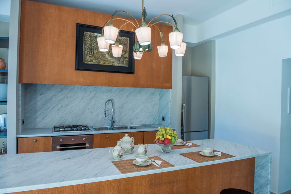 Apartment | Private kitchenette | Full-size fridge, microwave, oven, stovetop