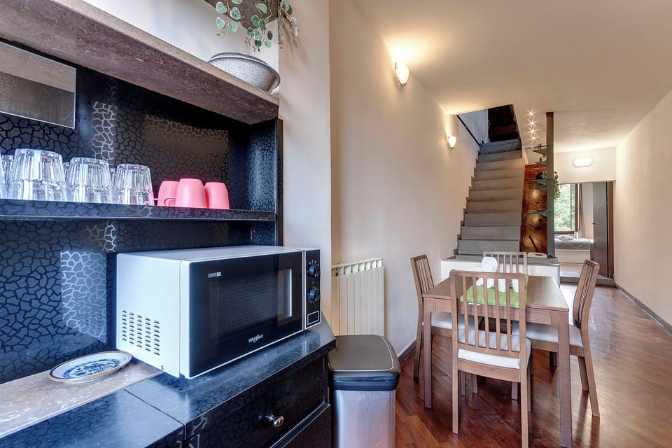 Apartment | Living area | 24-inch flat-screen TV with digital channels