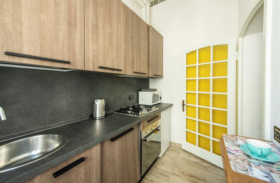 Apartment | Private kitchenette | Full-size fridge, microwave, oven, stovetop