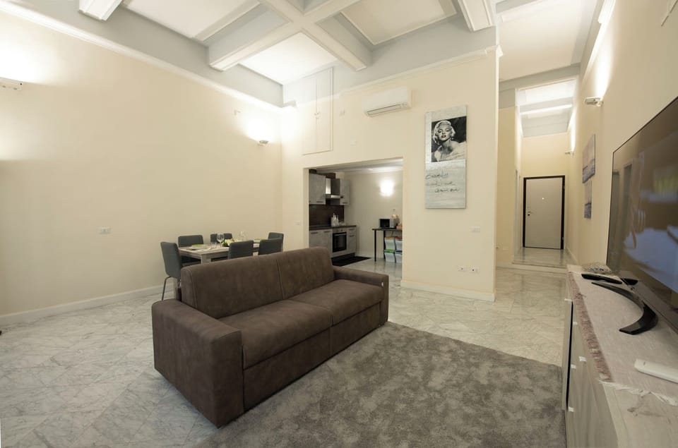 Apartment | Living area | 24-inch flat-screen TV with digital channels