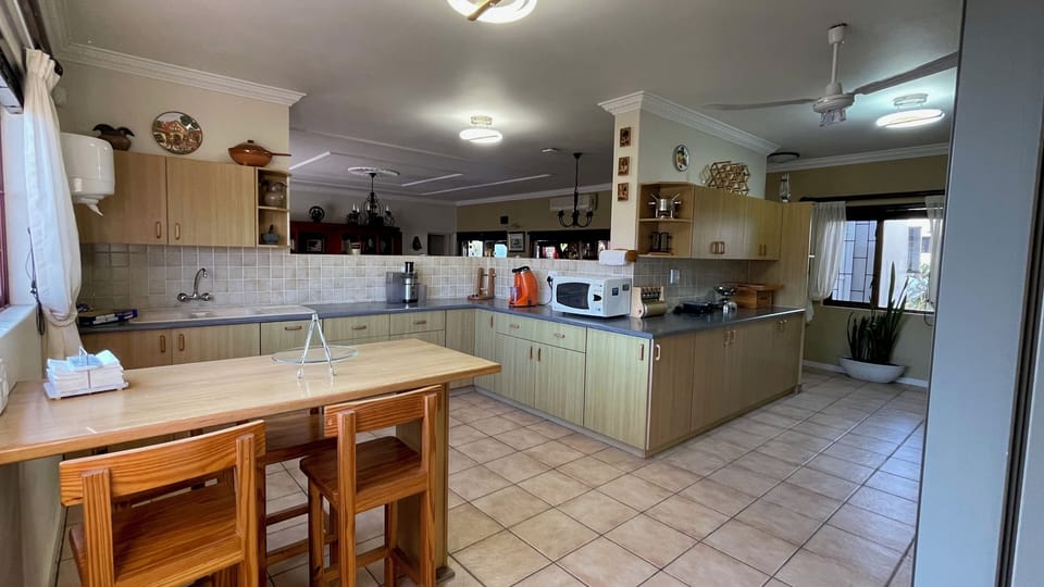 Family Apartment, City View | Private kitchen | Shared fridge, shared microwave