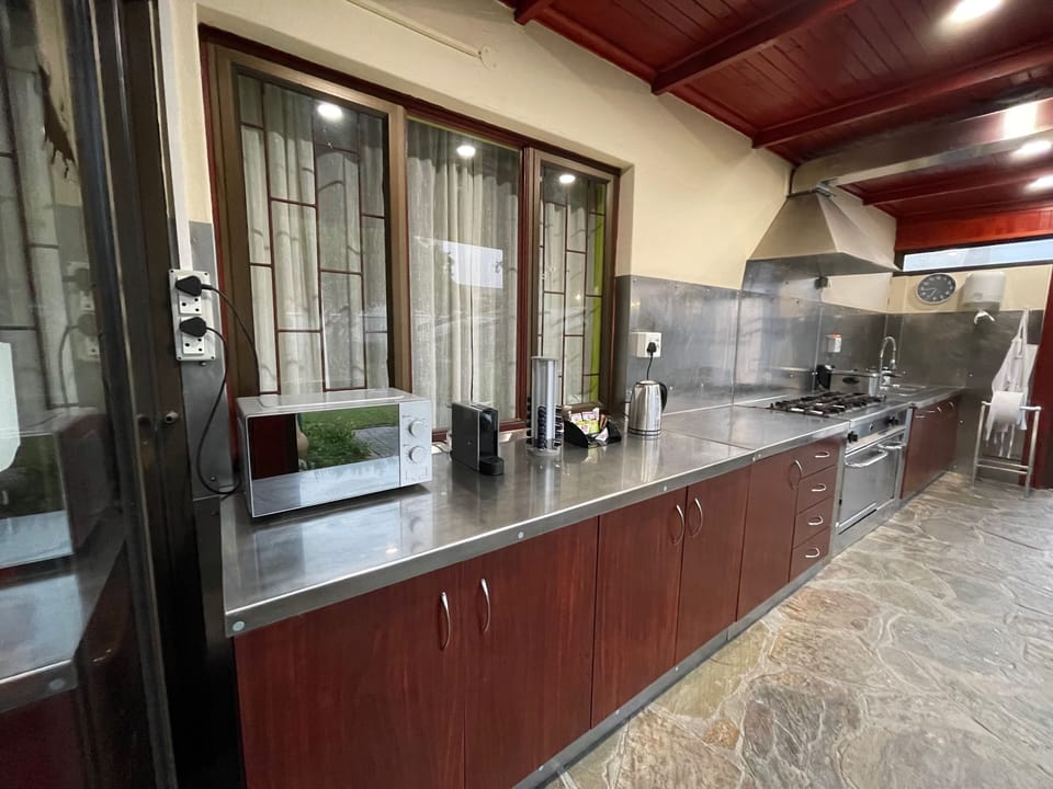 Family Apartment, City View | Shared kitchen | Shared fridge, shared microwave