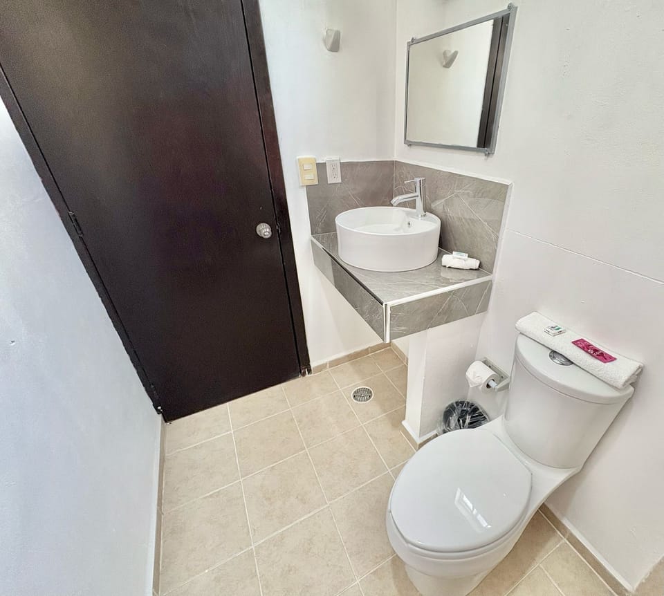Comfort Room | Bathroom | Shower, towels, soap, shampoo