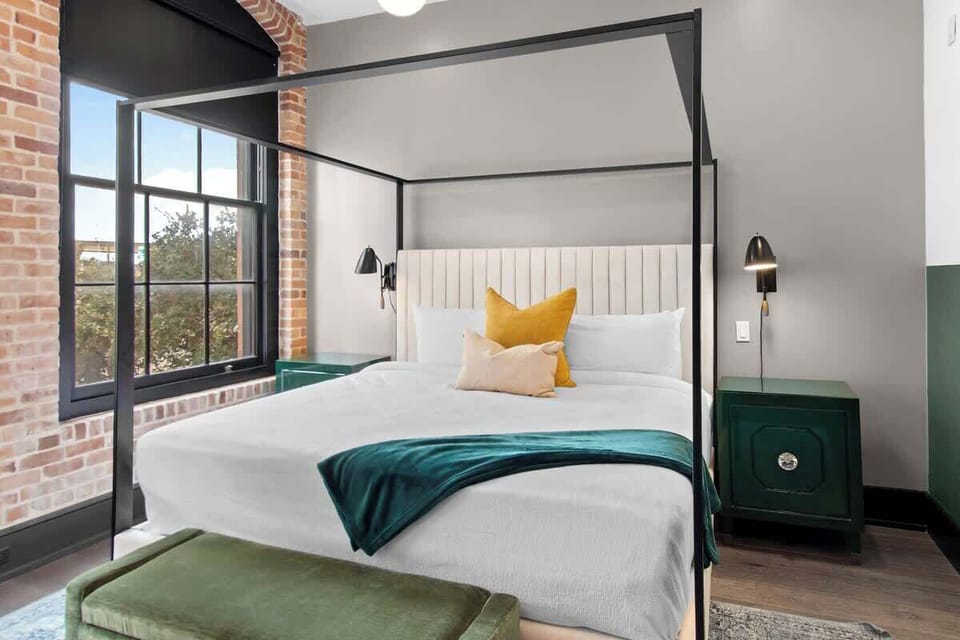 Retreat to the Primary bedroom with a plush king bed, walk-in closet, blackout shades, and a smart TV. Designed for comfort and privacy, this suite is perfect for recharging after a day exploring New Orleans.
