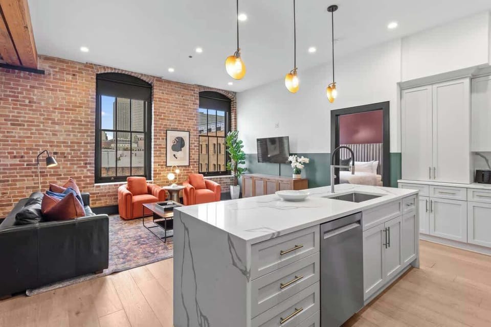 This property features 2 connecting living areas with 2 separate dining areas and kitchens equipped with a Dishwasher, Gas Stove and Microwave.