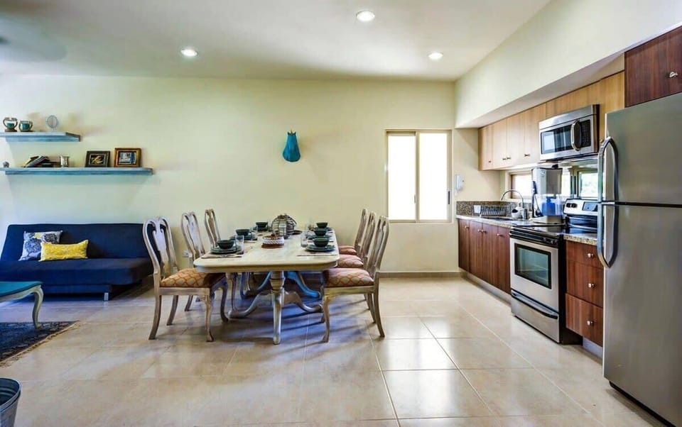 Dining Table and Fully Equipped Kitchen