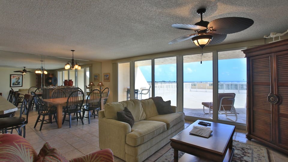 Spacious and comfortable living room and dining room overlooking the large patio!