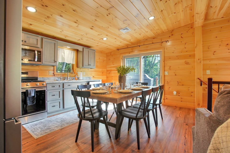 Step into the eat-in kitchen with a gorgeous, and spacious dining table that seats 8!