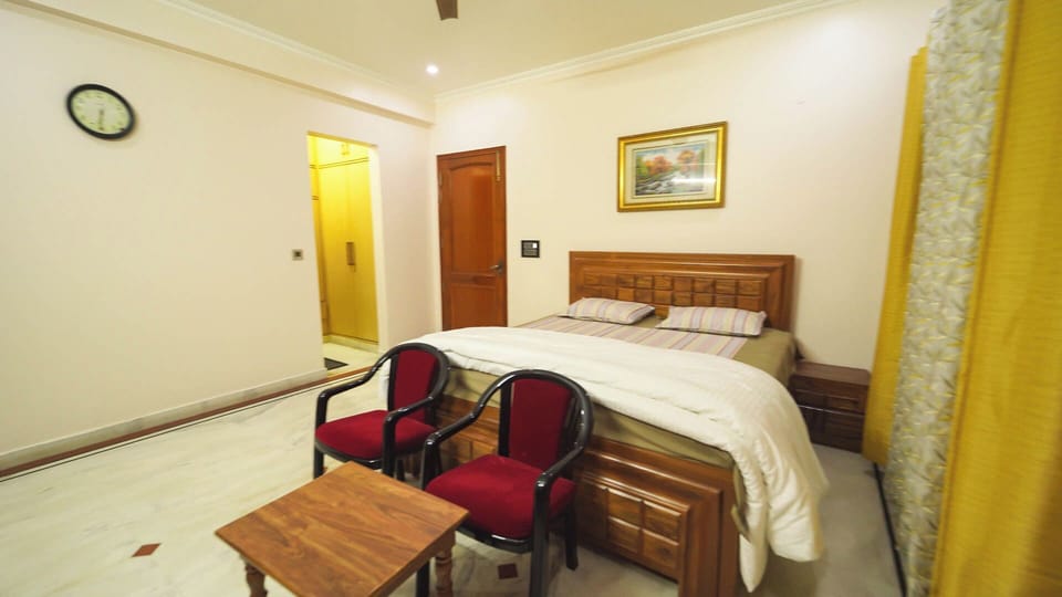 Premium Single Room, Smoking, Private Bathroom | Desk, laptop workspace, blackout drapes, iron/ironing board