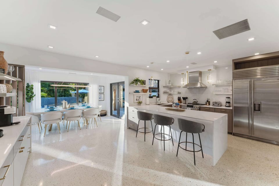 The heart of the home—an open-concept kitchen and dining area where cooking, dining, and gathering come together.