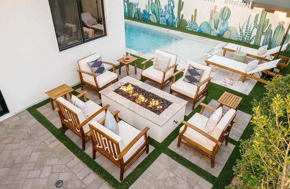 Settle into outdoor seating, cook up a feast on the BBQ grill, and take in the stunning outdoor gas grill for a sizzling BBQ, and admire the painted cactus and succulent mural adding an artistic touch and nod towards Arizona's stunning landscapes.