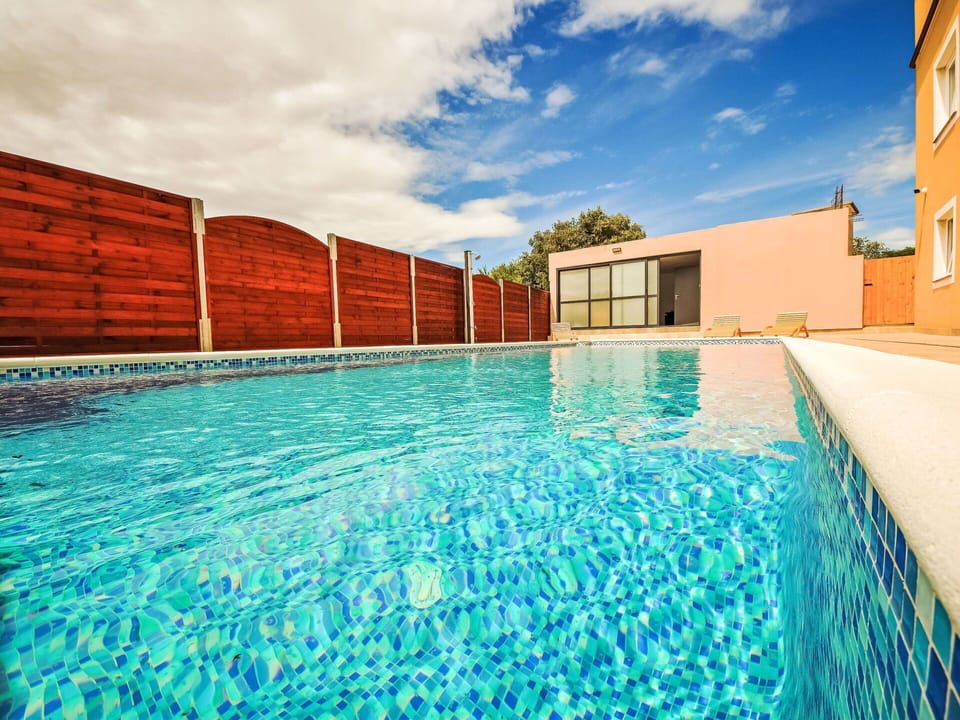 Water, Cloud, Sky, Swimming Pool, Plant, Rectangle, Outdoor Furniture, Tree, Shade, Leisure