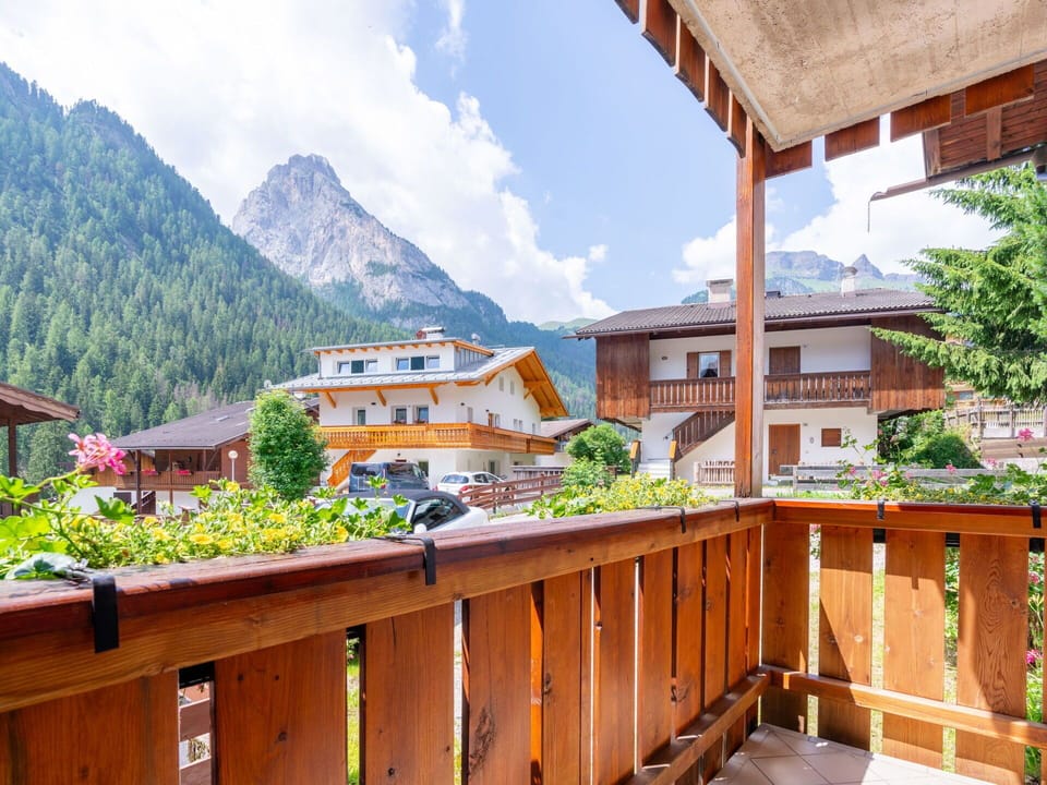 Sky, Cloud, Building, Property, Mountain, Window, Wood, Architecture, Urban Design, Tree
