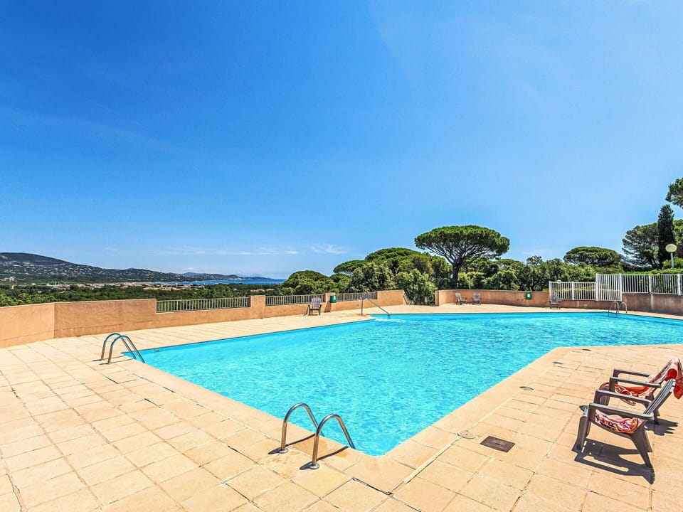 Water, Sky, Property, Plant, Swimming Pool, Azure, Rectangle, Tree, Outdoor Furniture, Leisure