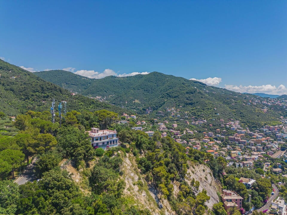 Sky, Mountain, Cloud, Plant, Natural Landscape, Tree, Highland, Landscape, Building, City