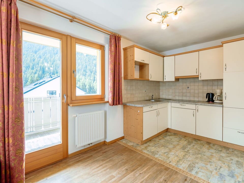 Cabinetry, Property, Countertop, Window, Azure, Wood, Interior Design, Wood Stain, Floor, Flooring