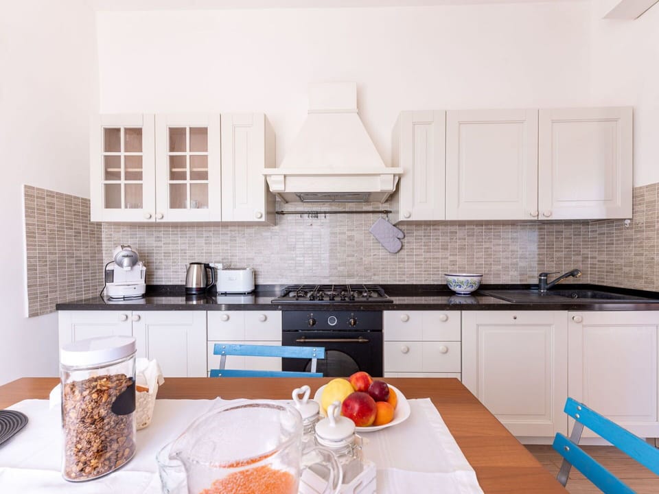 Cabinetry, Property, Countertop, Sink, Kitchen, Window, Building, Wood, Interior Design, Kitchen Stove