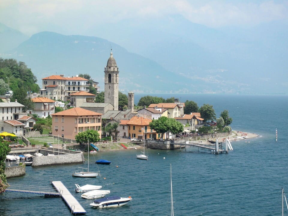Water, Sky, Cloud, Building, Boat, Mountain, Azure, Watercraft, Coastal And Oceanic Landforms, Body Of Water