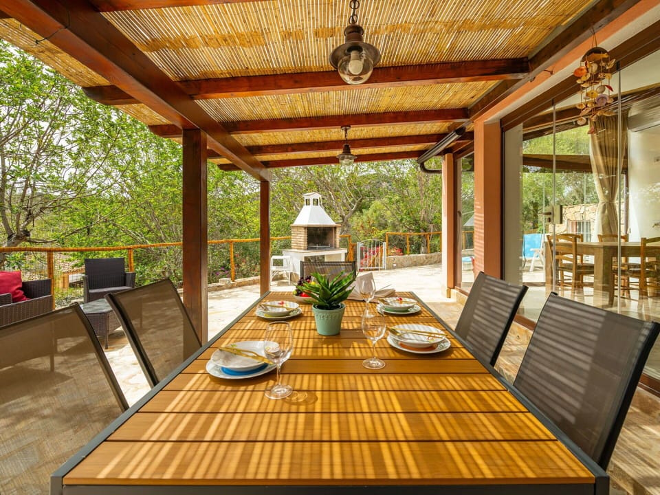 Table, Property, Furniture, Wood, Interior Design, Lighting, Architecture, Shade, Floor, Plant
