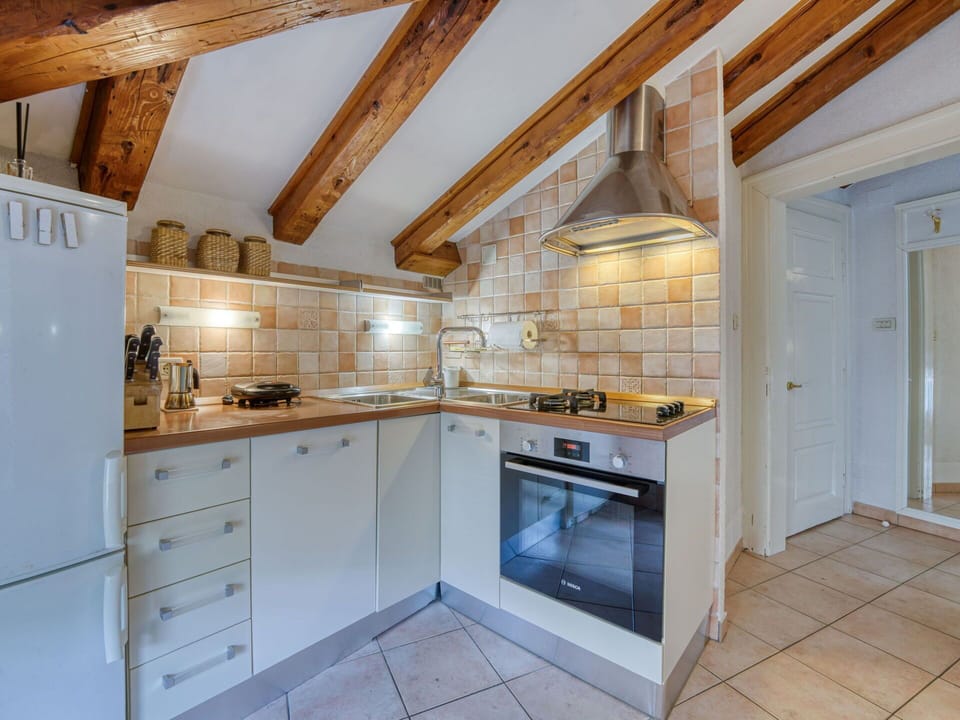 Cabinetry, Furniture, Countertop, Building, Kitchen, Wood, Interior Design, Kitchen Stove, Kitchen Appliance, Flooring