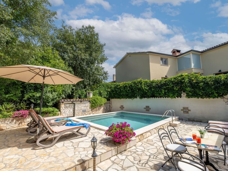 Plant, Cloud, Water, Property, Furniture, Building, Sky, Swimming Pool, Chair, Tree