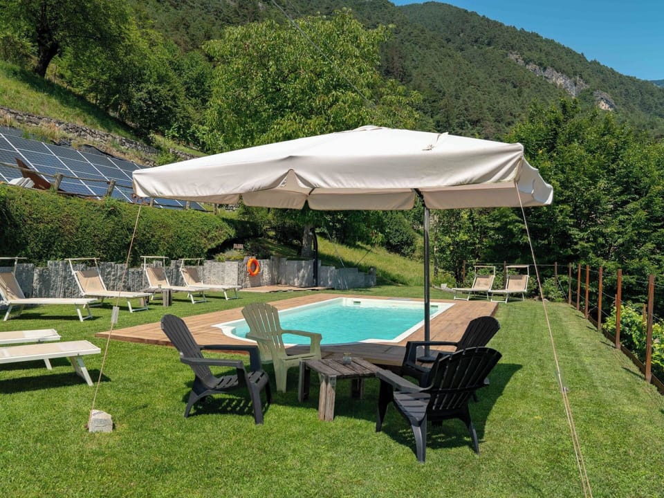 Umbrella, Outdoor Furniture, Furniture, Shade, Swimming Pool, Sunlounger, Mountain Range, Chair, Resort, Outdoor Table
