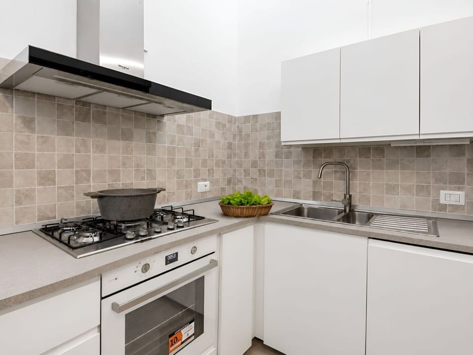Kitchen, Kitchen Appliance, Countertop, Major Appliance, Kitchen Stove, Stove, Flooring, Cabinetry, Gas Stove, Home Appliance