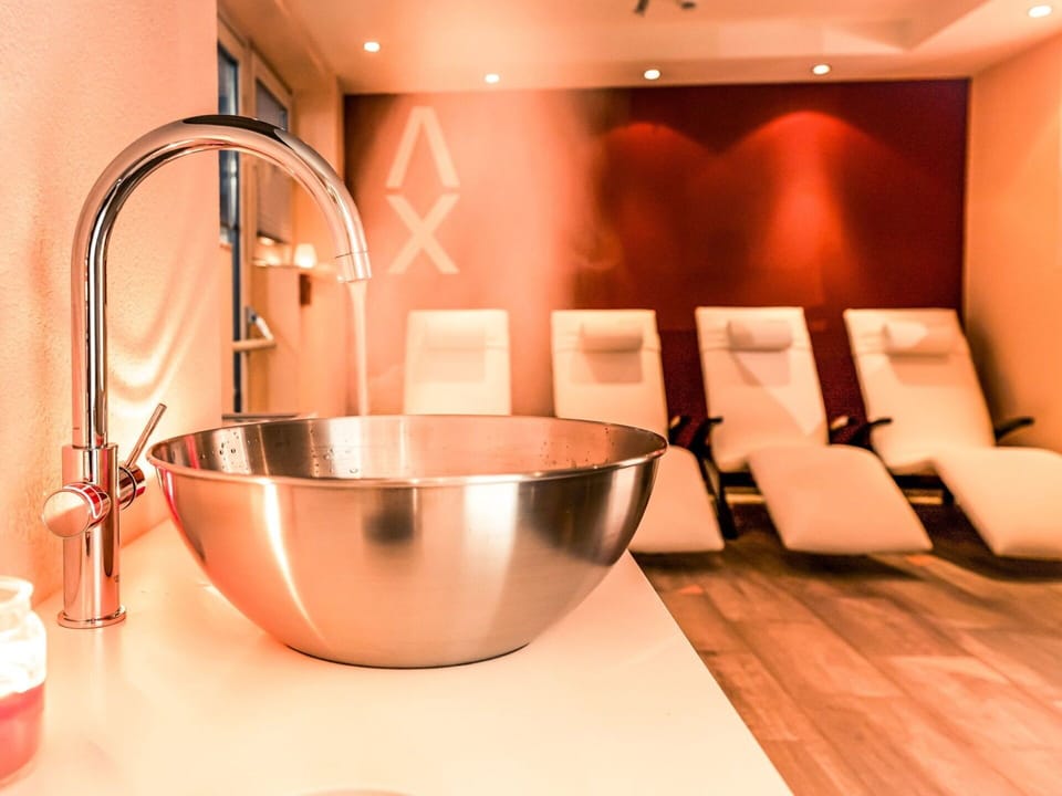 Building, Sink, Tap, Lighting, Interior Design, Orange, Decoration, Wood, Flooring, Countertop