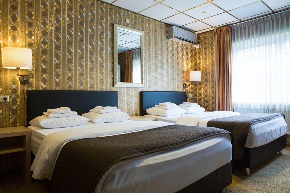 Quadruple Room, 2 Double Beds | In-room safe, desk, soundproofing, iron/ironing board
