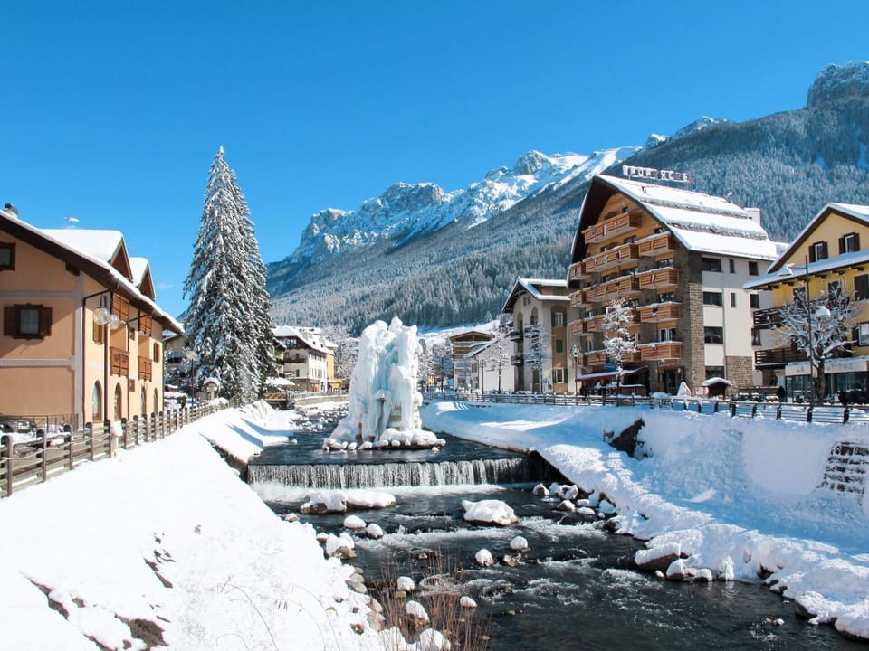 Sky, Property, Furniture, Table, Azure, Chair, Building, Window, Shade, Architecture