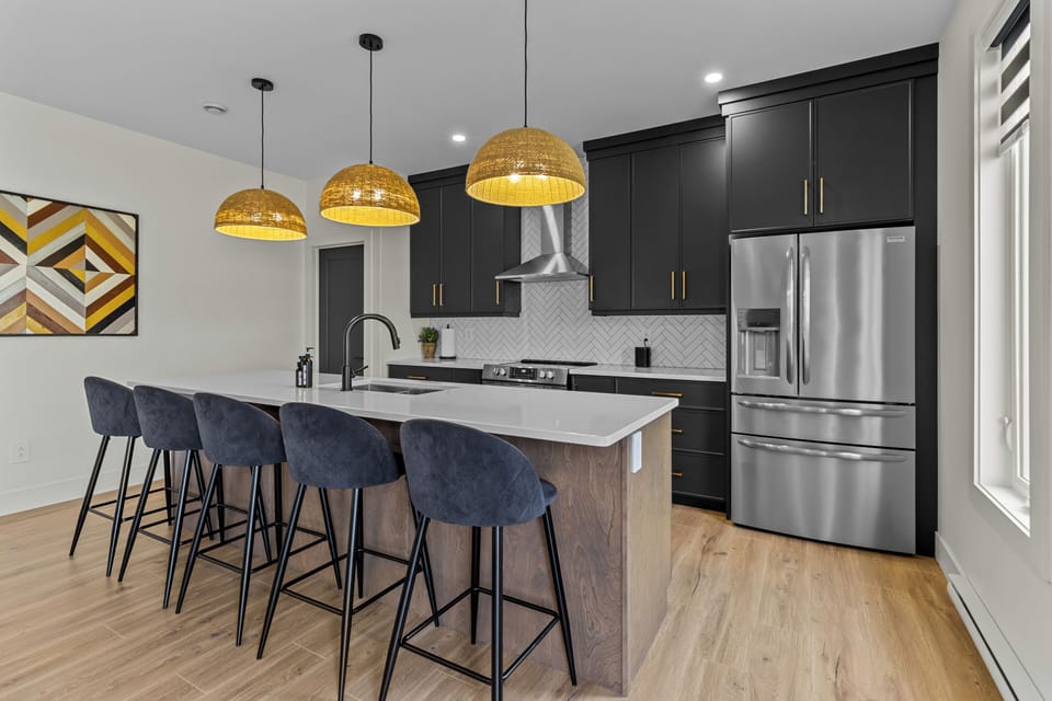 Cook, dine, and unwind in style! This open-concept kitchen with a spacious island and seating for five is perfect for gatherings and gourmet adventures.