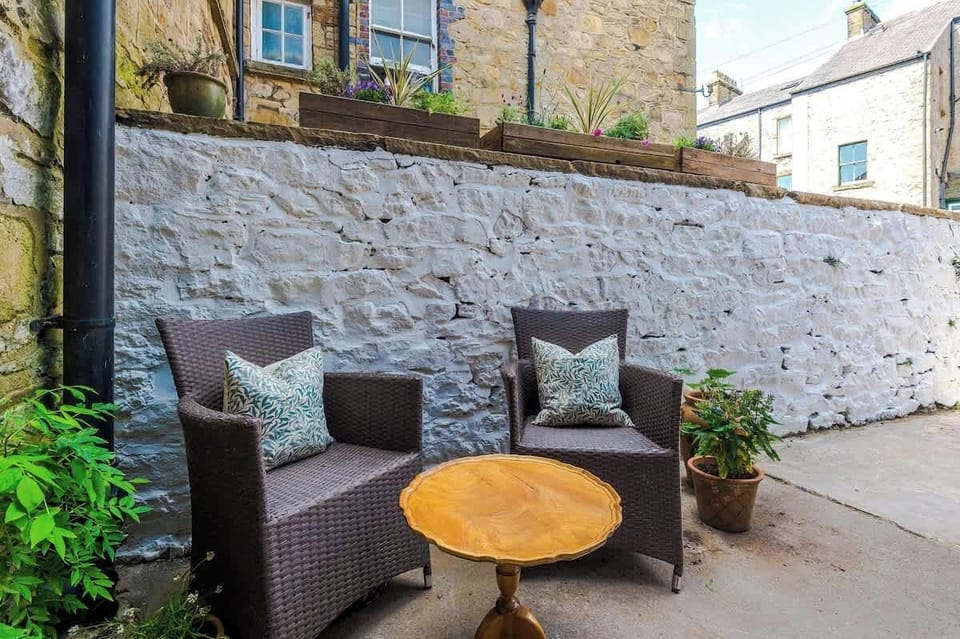 Charming patio space. An intimate outdoor setting ideal for morning coffee or unwinding after a day of exploration.