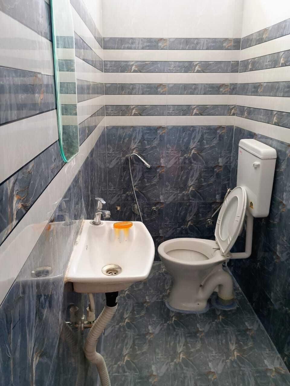 Deluxe Room, Balcony | Raised toilet seat