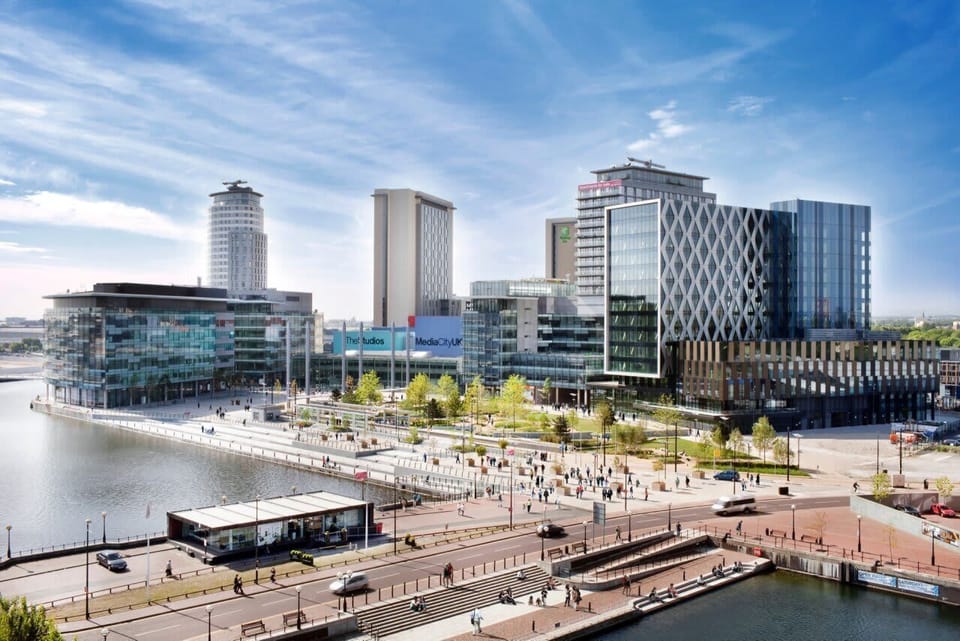 Enjoy panoramic views across Manchester from this prime waterside location