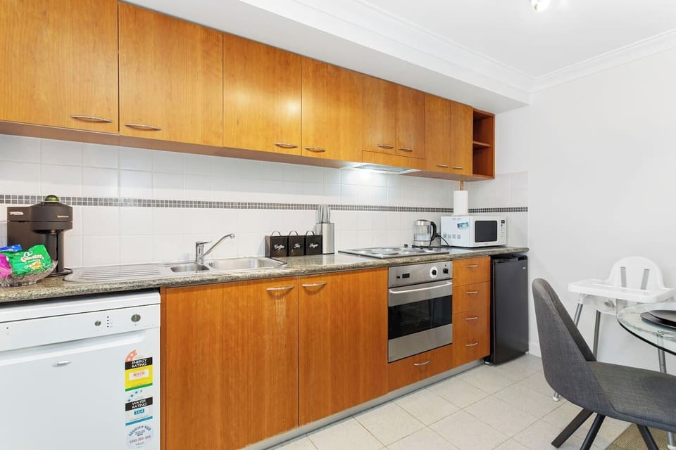 Our fully equipped kitchen has everything you need to whip up delicious meals during your stay, including a microwave, oven, and dishwasher for convenience.

