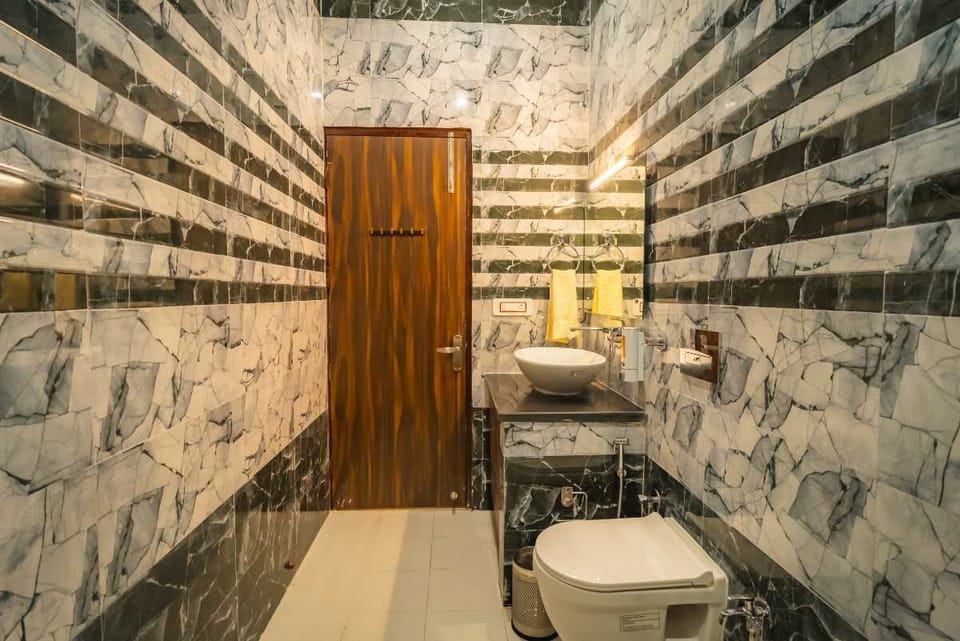 Deluxe Double Room, Mountain View | Bathroom | Shower, slippers, towels, soap