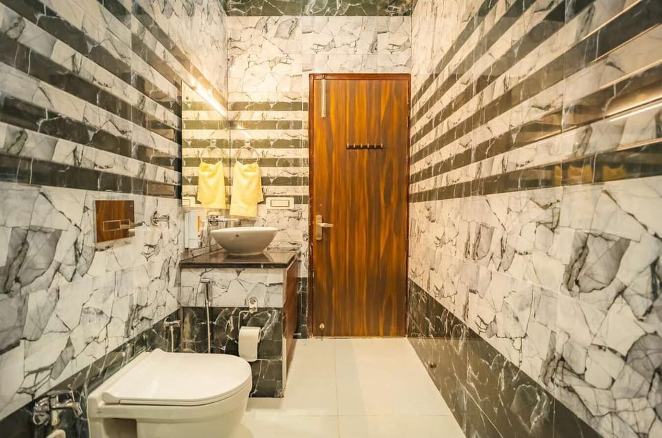 Deluxe Single Room, Garden View | Bathroom | Shower, slippers, towels, soap