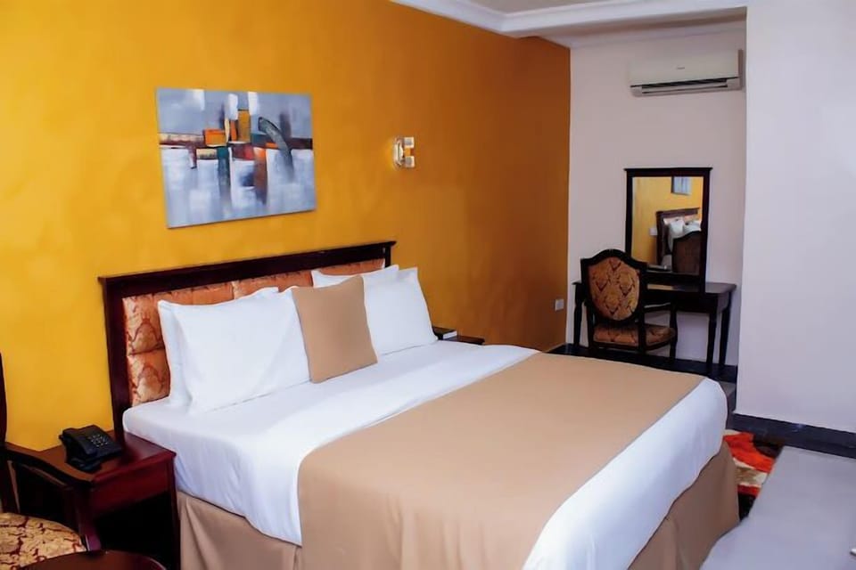 Deluxe Room, Balcony, City View | Desk, laptop workspace, free WiFi