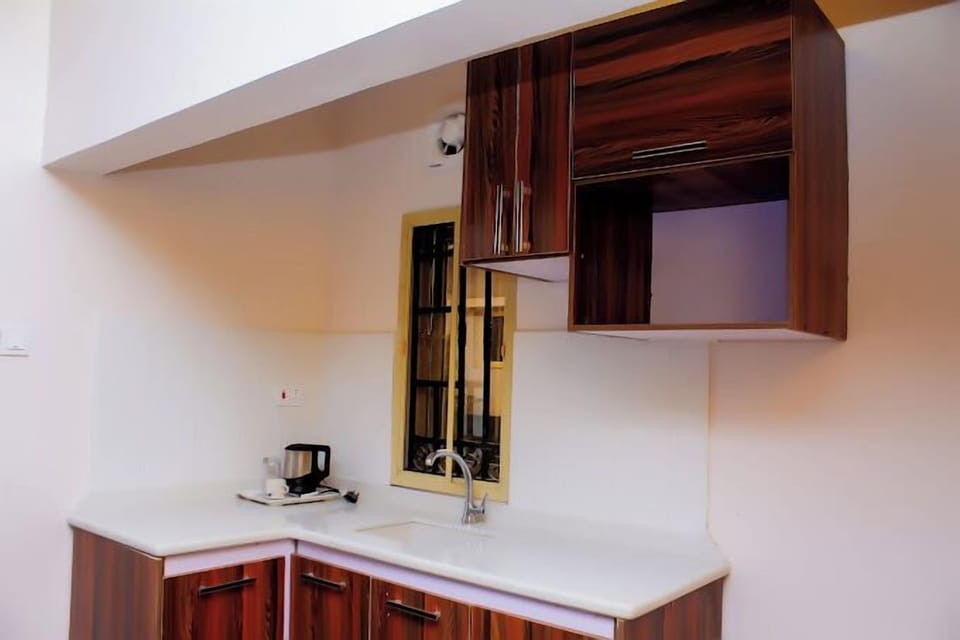 Deluxe Room, Balcony, City View | Private kitchen | Mini-fridge