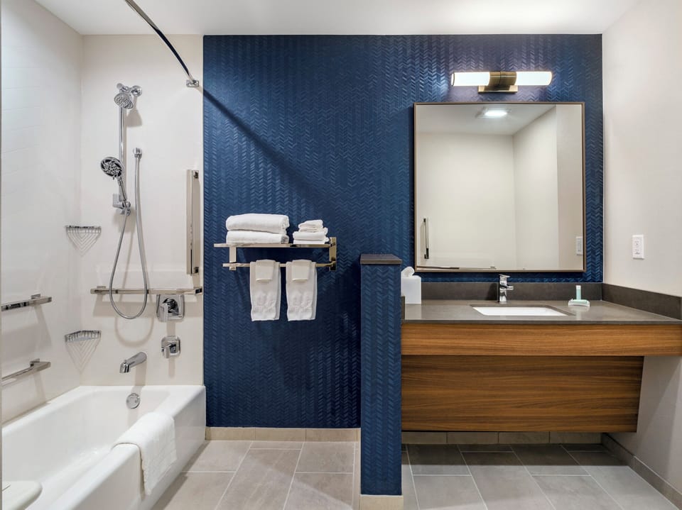 Hair dryer, towels, soap, shampoo