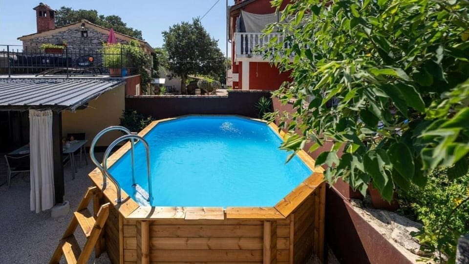 The swimming pool of Casa Dvi Mendule