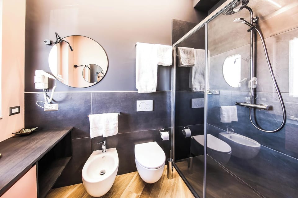 Superior Double Room, Balcony | Bathroom | Shower, hair dryer, towels, soap