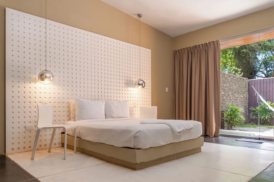 Deluxe Suite | 12 bedrooms, individually furnished, blackout drapes, iron/ironing board