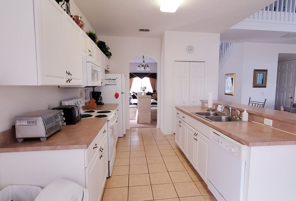Villa, Multiple Beds, Pool Access, Pool View (5 Bed Florida Villa - West Haven) | Private kitchen | Fridge, microwave, oven, stovetop