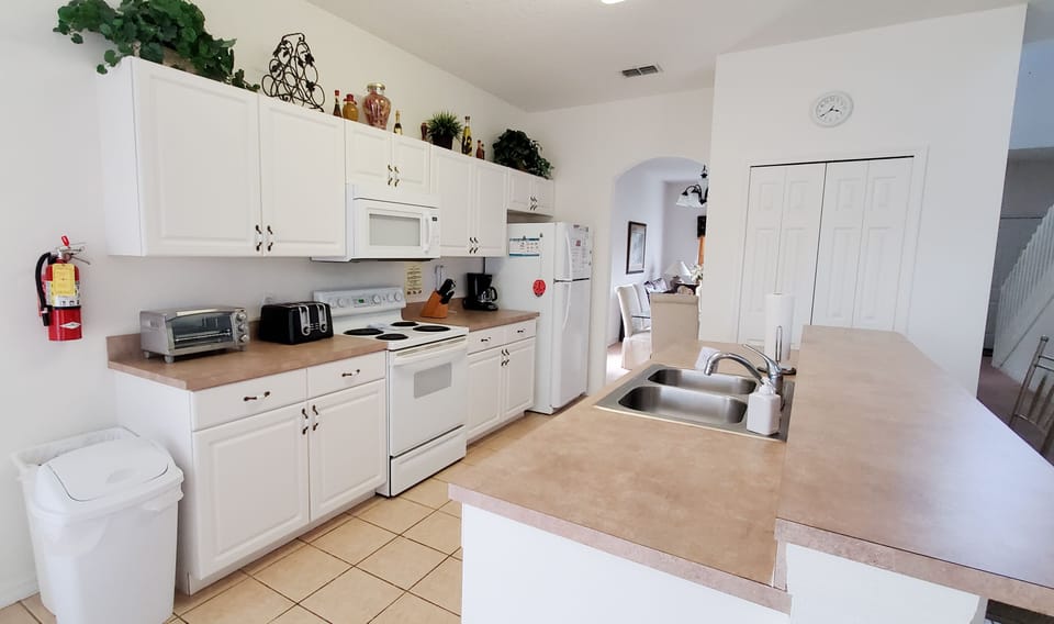 Villa, Multiple Beds, Pool Access, Pool View (5 Bed Florida Villa - West Haven) | Private kitchen | Fridge, microwave, oven, stovetop