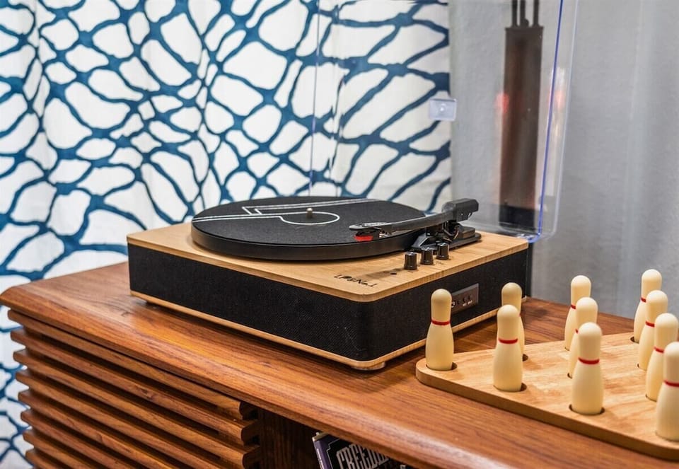 Kick back and enjoy some tunes with the vintage record player and a selection of games.