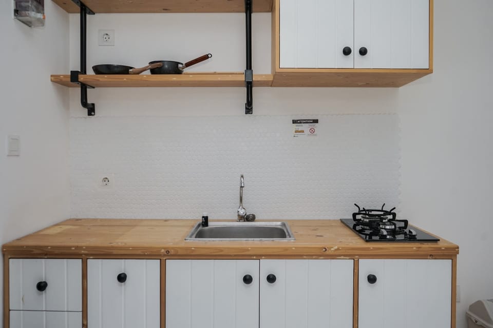 Deluxe Studio | Private kitchen | Fridge