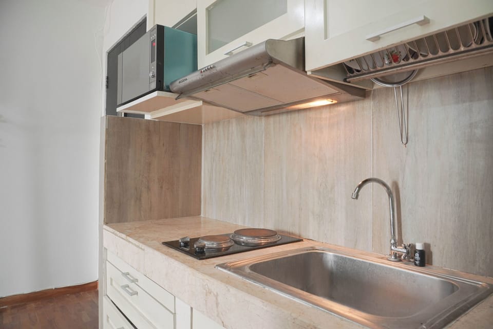 Apartment | Private kitchen | Fridge, microwave, stovetop, rice cooker